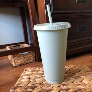 mint green reusable cup with lid and straw (comes with pack of Disney Stickers)